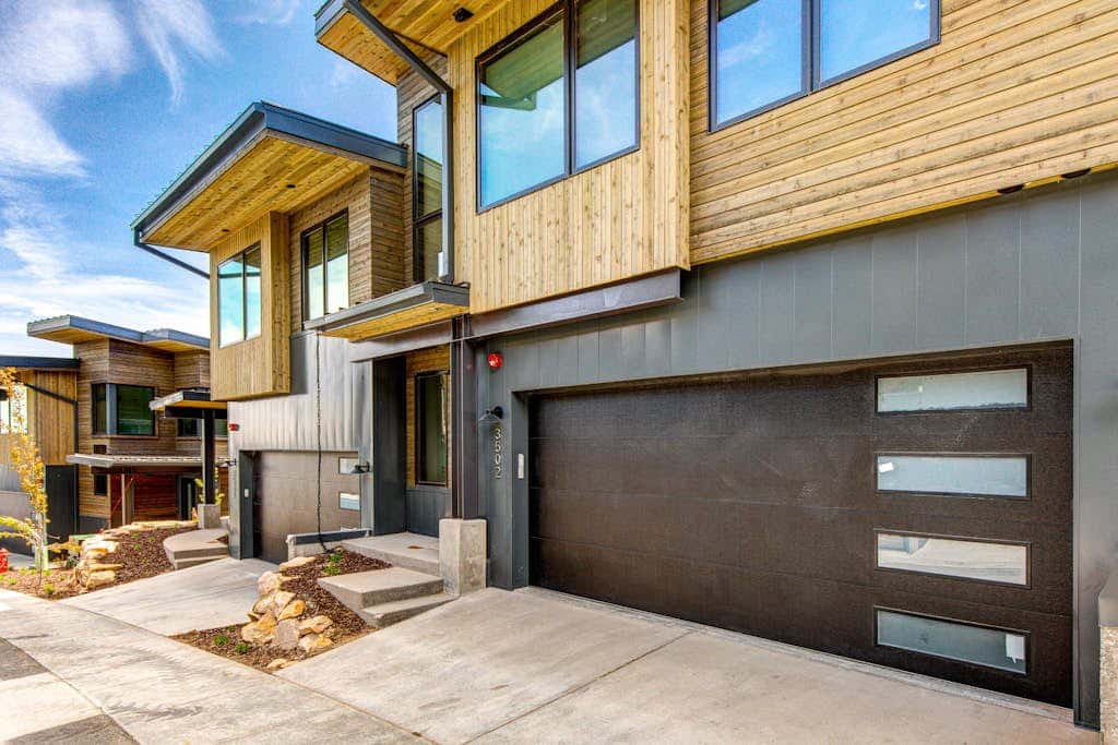 Updated home with a private hot tub, fireplace, & mountain views - dog friendly