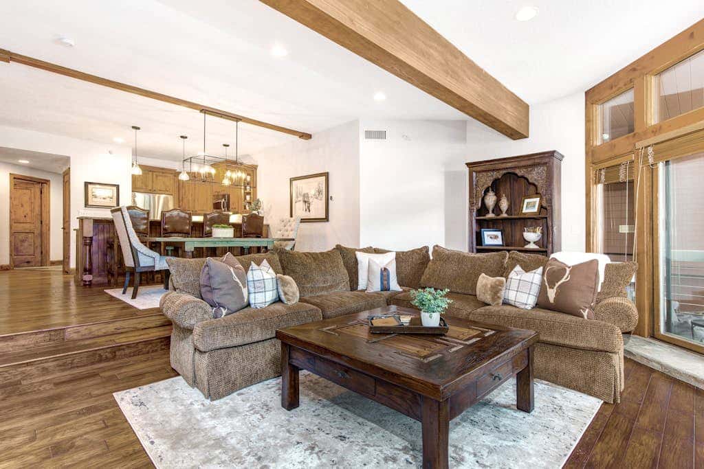 Luxury Deer Valley condo featuring a private hot tub and cozy stone fireplace.
