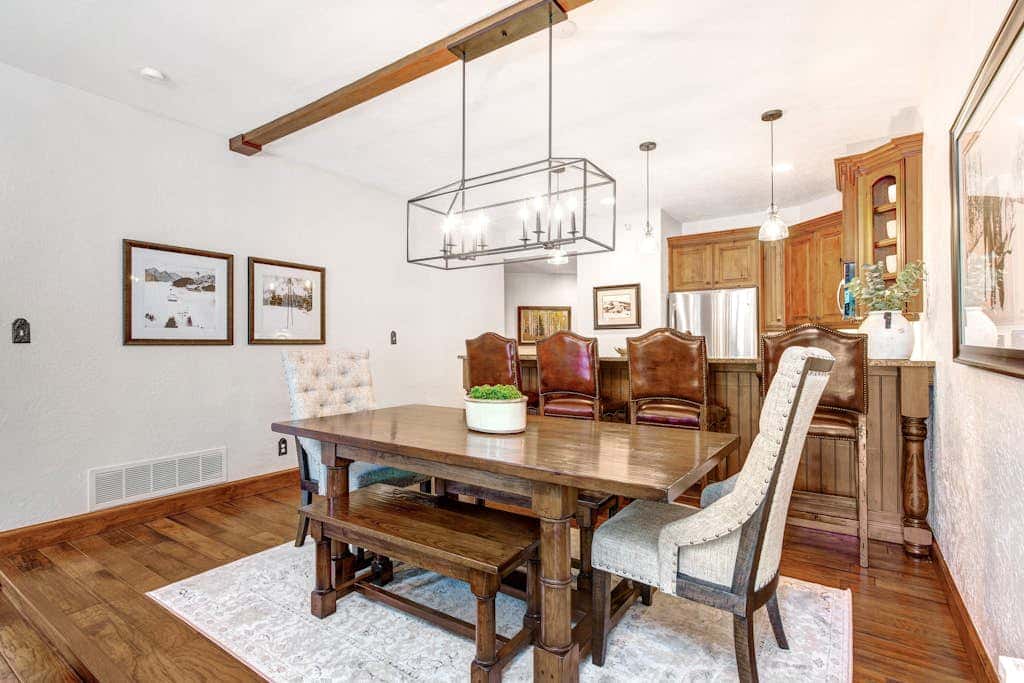 Luxury Deer Valley condo featuring a private hot tub and cozy stone fireplace.
