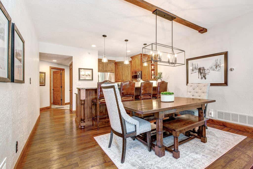 Luxury Deer Valley condo featuring a private hot tub and cozy stone fireplace.