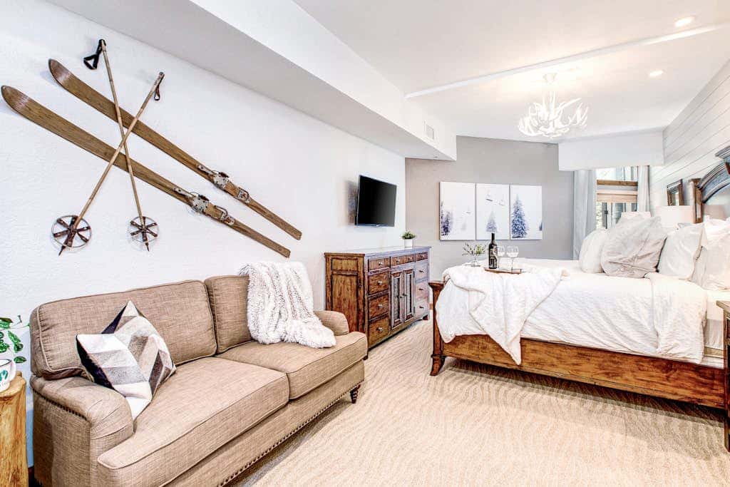 Luxury Deer Valley condo featuring a private hot tub and cozy stone fireplace.