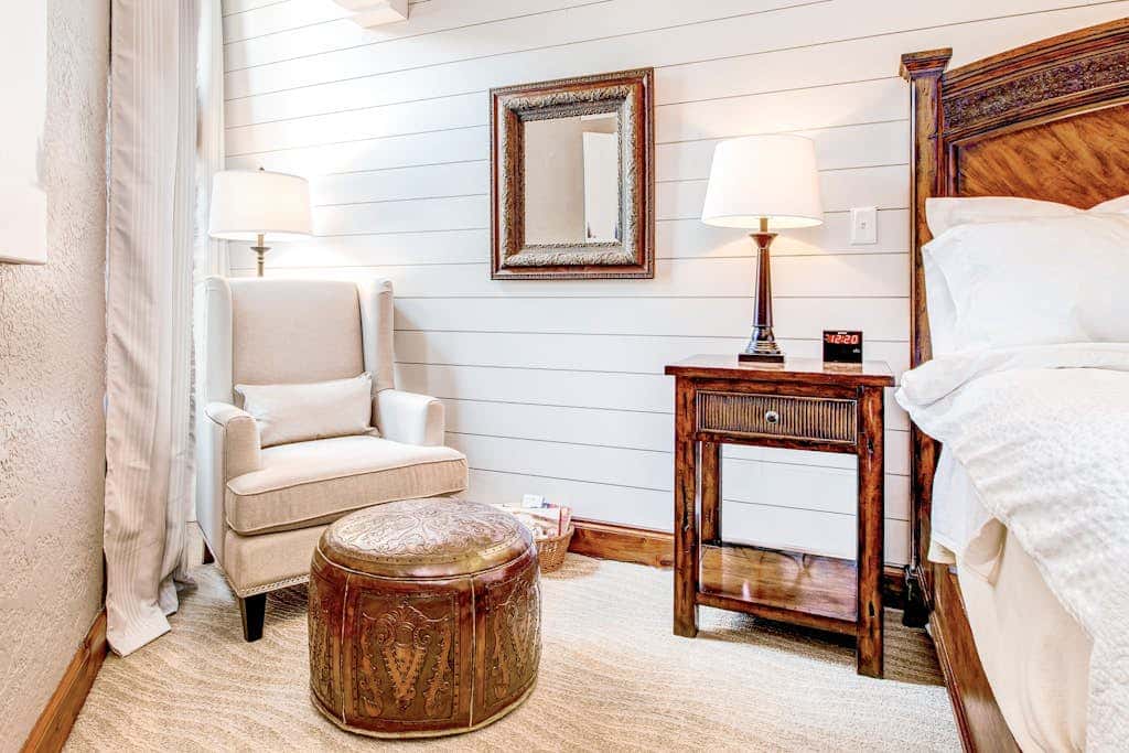 Luxury Deer Valley condo featuring a private hot tub and cozy stone fireplace.