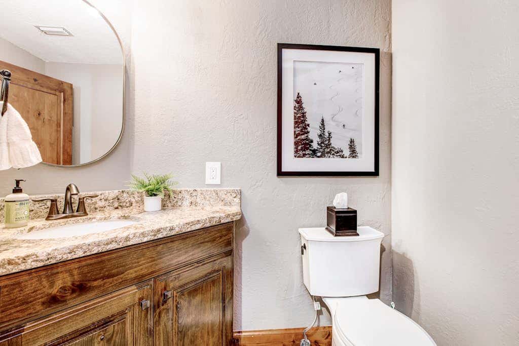 Luxury Deer Valley condo featuring a private hot tub and cozy stone fireplace.