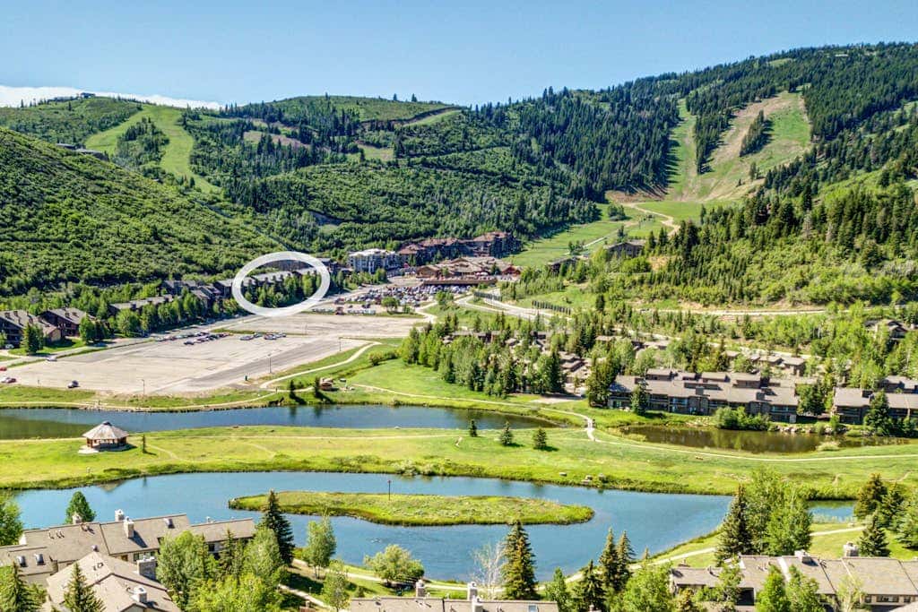 Luxury Deer Valley condo featuring a private hot tub and cozy stone fireplace.