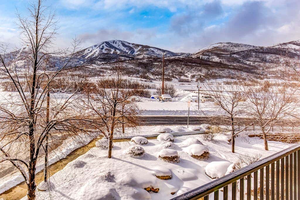 Plush condo with pool, gym, hot tubs, garage & central AC - snowbird-friendly
