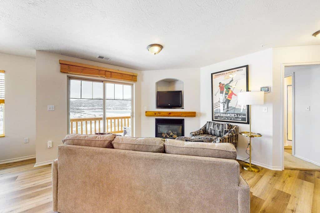 Amazing lake view condo with  fireplace, balcony, shared pool & hot tub