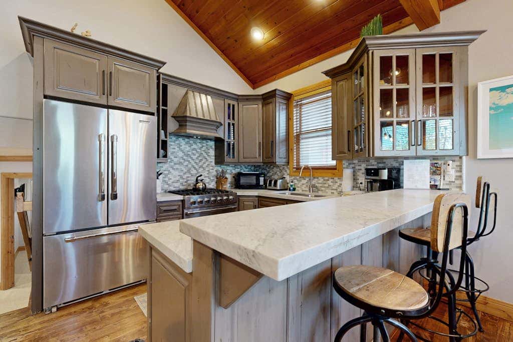 Cozy, family-friendly home with  a private hot tub, gas fireplace, two decks, WiFi