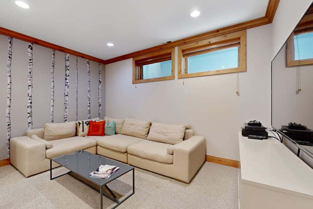 Cozy, family-friendly home with  a private hot tub, gas fireplace, two decks, WiFi