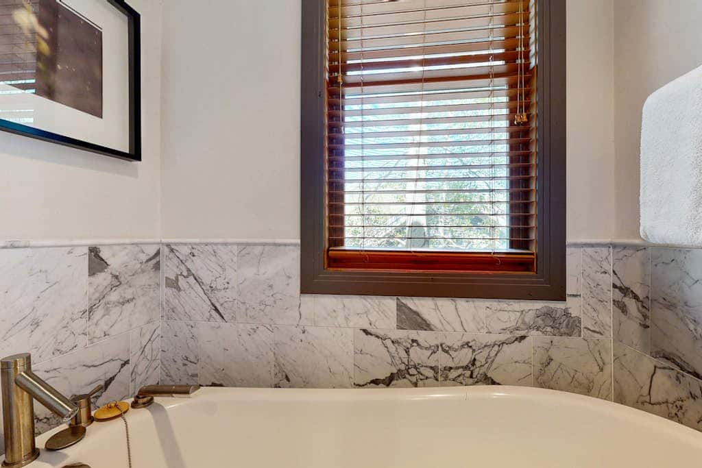 Cozy, family-friendly home with  a private hot tub, gas fireplace, two decks, WiFi