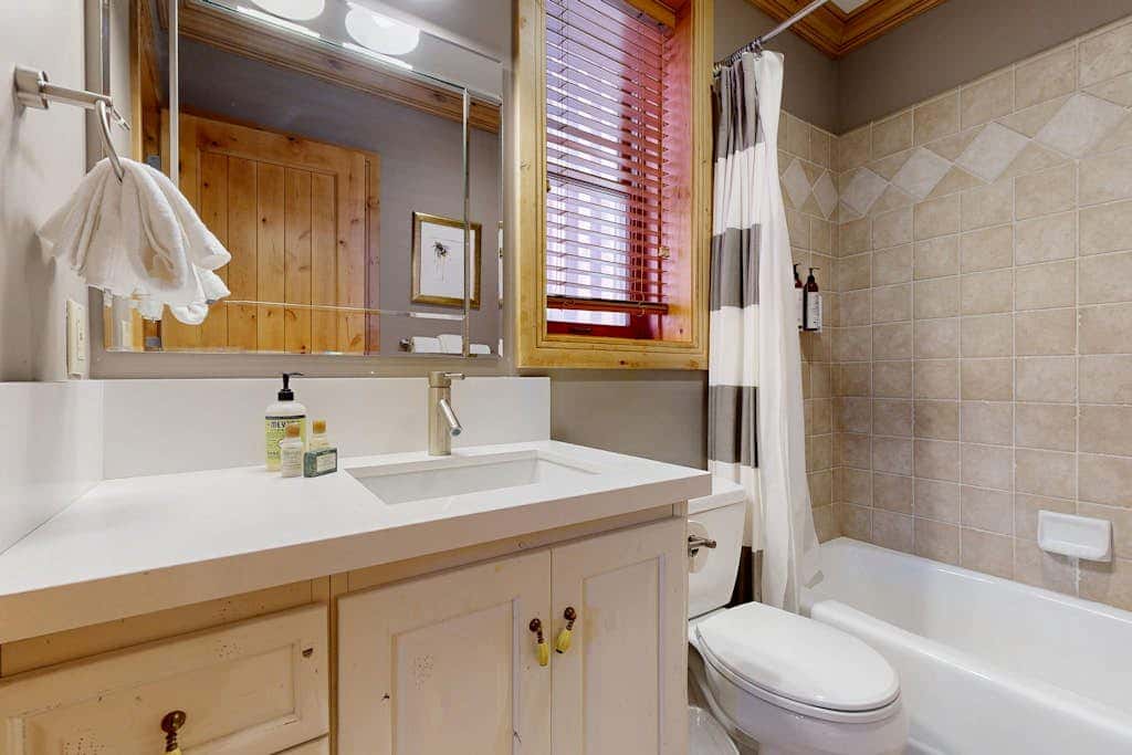 Cozy, family-friendly home with  a private hot tub, gas fireplace, two decks, WiFi