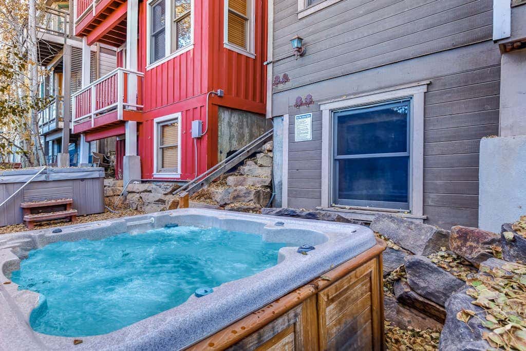 Cozy, family-friendly home with  a private hot tub, gas fireplace, two decks, WiFi