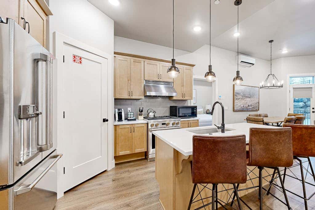 Modern resort condo with pool, hot tub + shuttle service