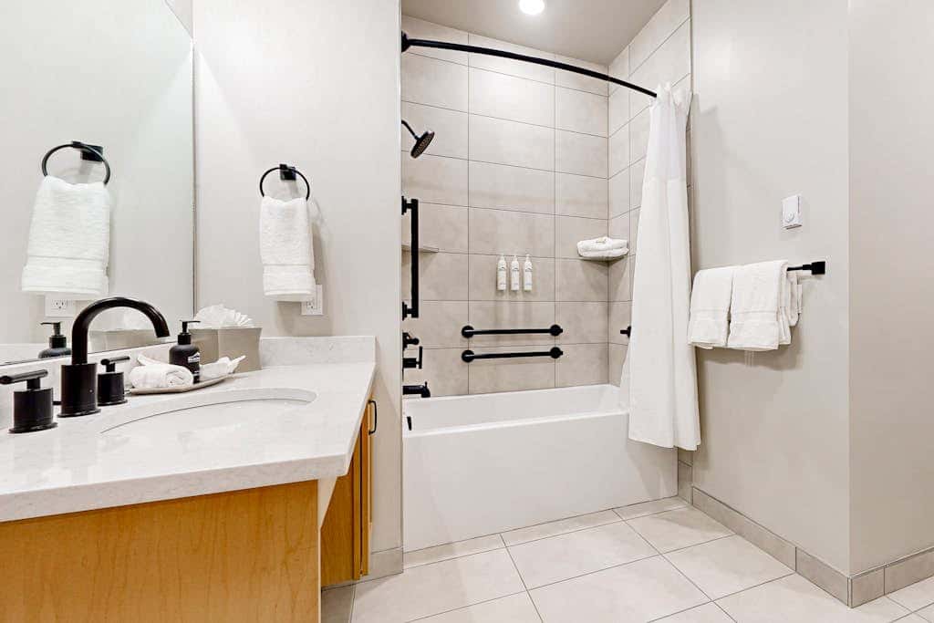 Modern resort condo with pool, hot tub + shuttle service