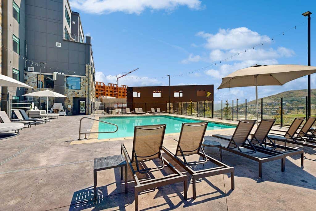 Modern resort condo with pool, hot tub + shuttle service