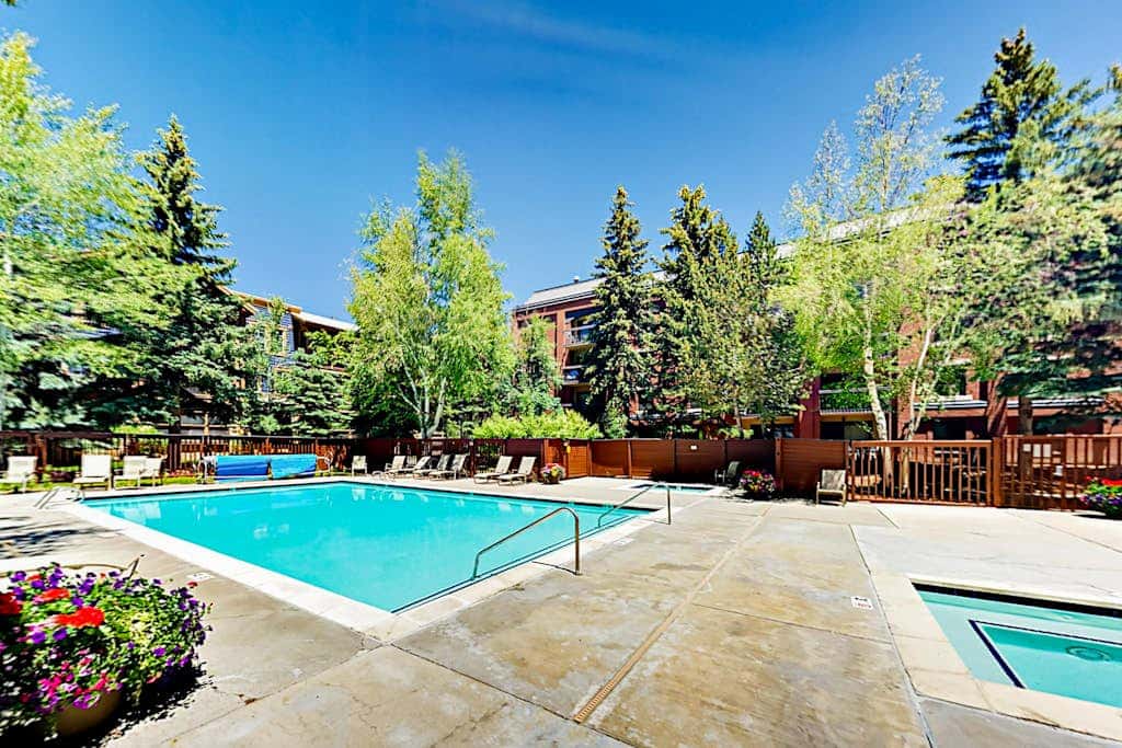 Mountain escape with pool, hot tub & balcony - near town lift & Main St