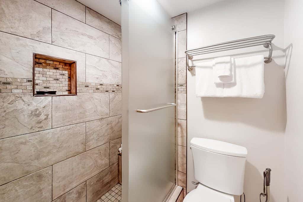 Mountain escape with pool, hot tub & balcony - near town lift & Main St