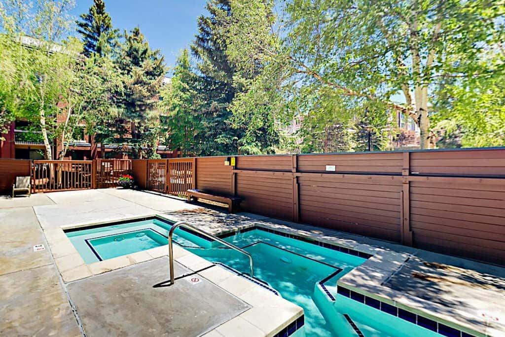 Mountain escape with pool, hot tub & balcony - near town lift & Main St