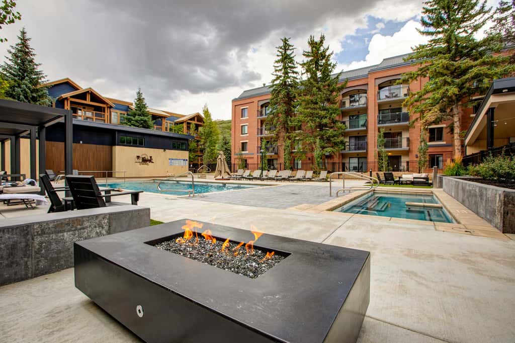Mountain escape with pool, hot tub & balcony - near town lift & Main St
