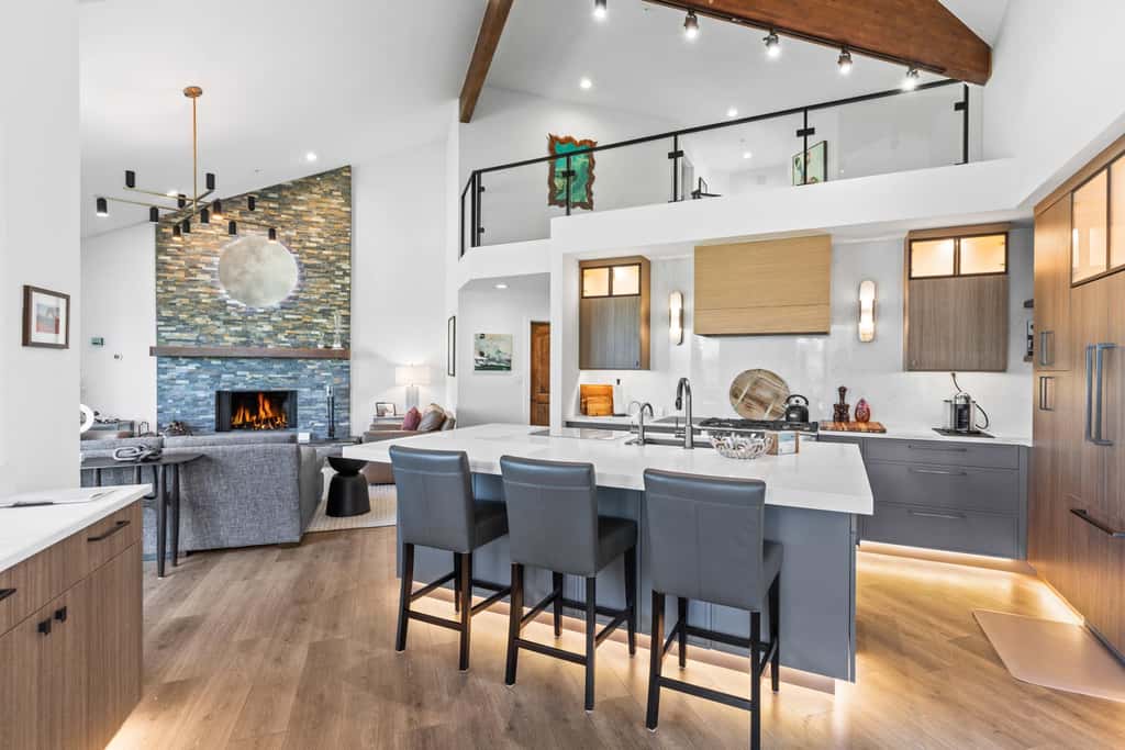 Mountain-view abode with a hot tub, scenic balcony, fireplaces, & free shuttle