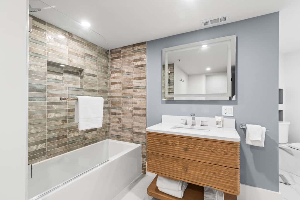 Mountain-view abode with a hot tub, scenic balcony, fireplaces, & free shuttle