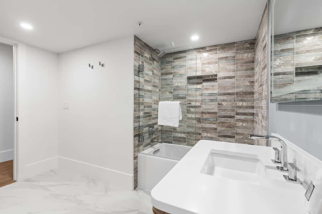 Mountain-view abode with a hot tub, scenic balcony, fireplaces, & free shuttle