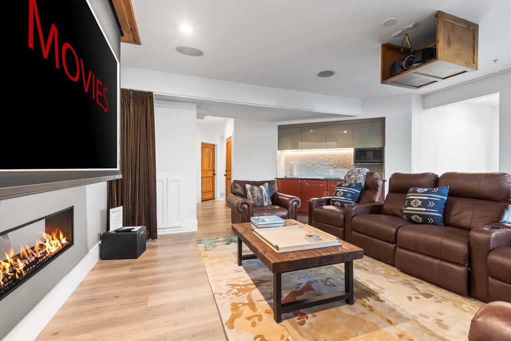 Mountain-view abode with a hot tub, scenic balcony, fireplaces, & free shuttle