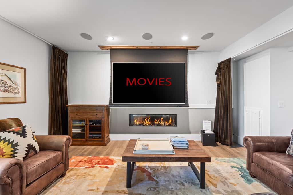 Mountain-view abode with a hot tub, scenic balcony, fireplaces, & free shuttle