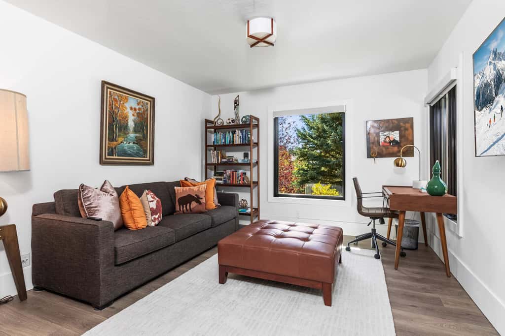 Mountain-view abode with a hot tub, scenic balcony, fireplaces, & free shuttle