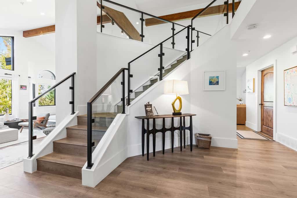 Mountain-view abode with a hot tub, scenic balcony, fireplaces, & free shuttle