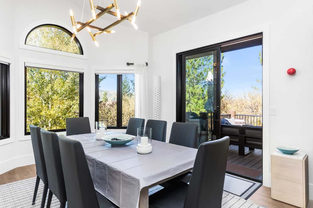 Mountain-view abode with a hot tub, scenic balcony, fireplaces, & free shuttle