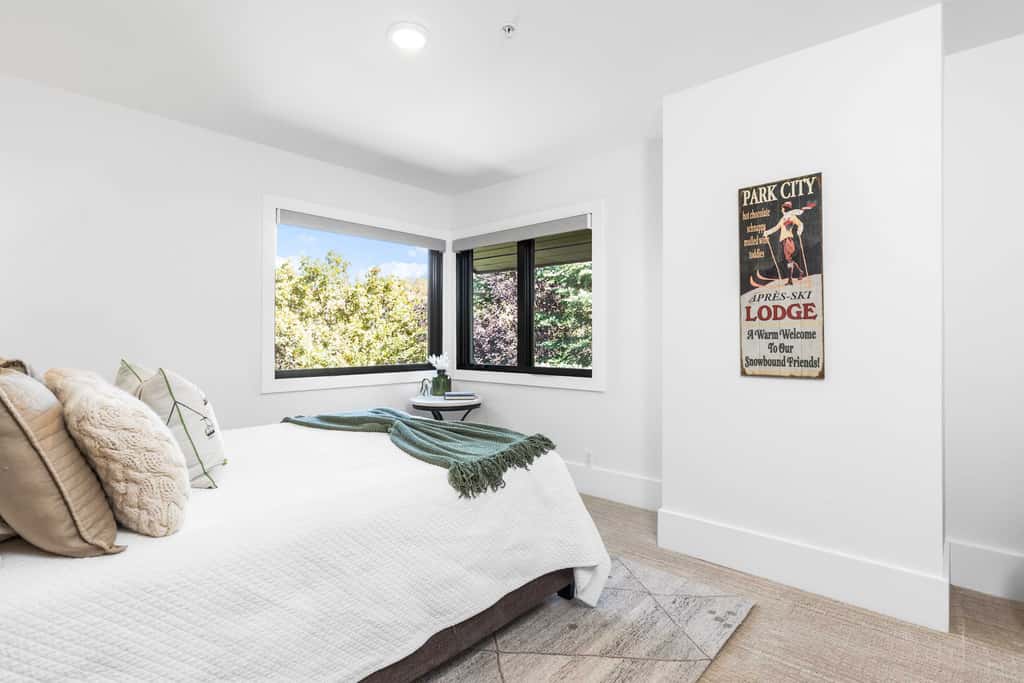 Mountain-view abode with a hot tub, scenic balcony, fireplaces, & free shuttle