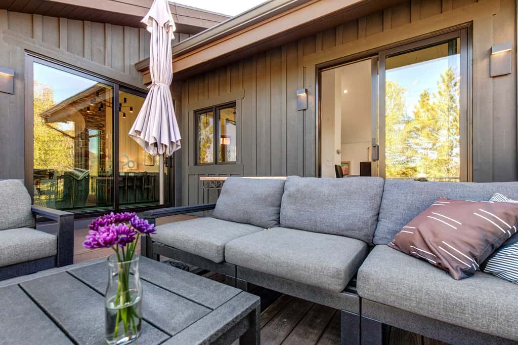 Mountain-view abode with a hot tub, scenic balcony, fireplaces, & free shuttle