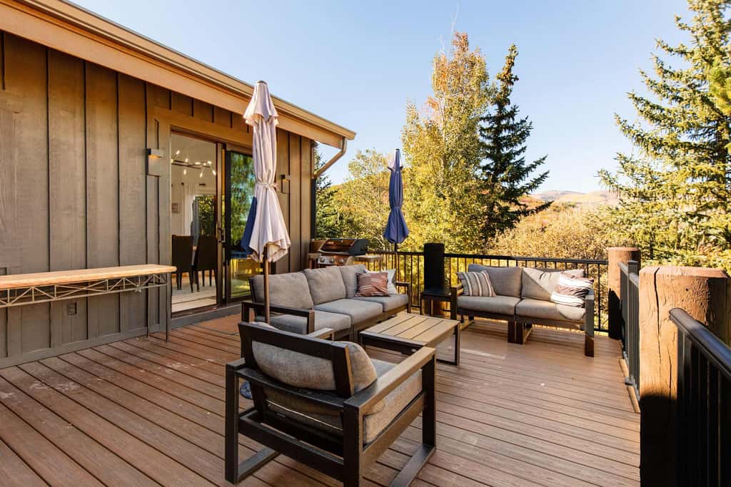 Mountain-view abode with a hot tub, scenic balcony, fireplaces, & free shuttle