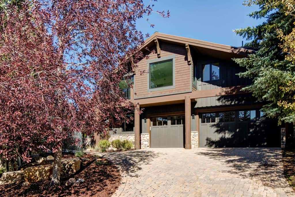 Mountain-view abode with a hot tub, scenic balcony, fireplaces, & free shuttle