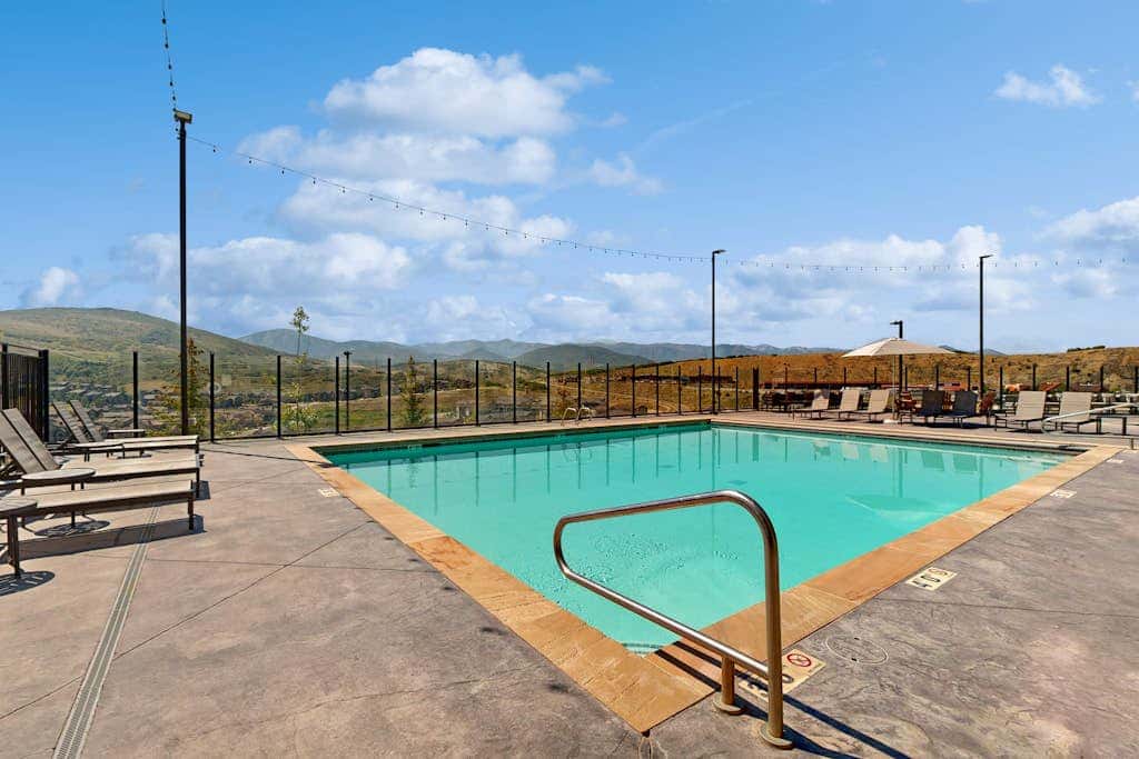 Modern resort condo with pool, hot tub, rolling foothill views & shuttle
