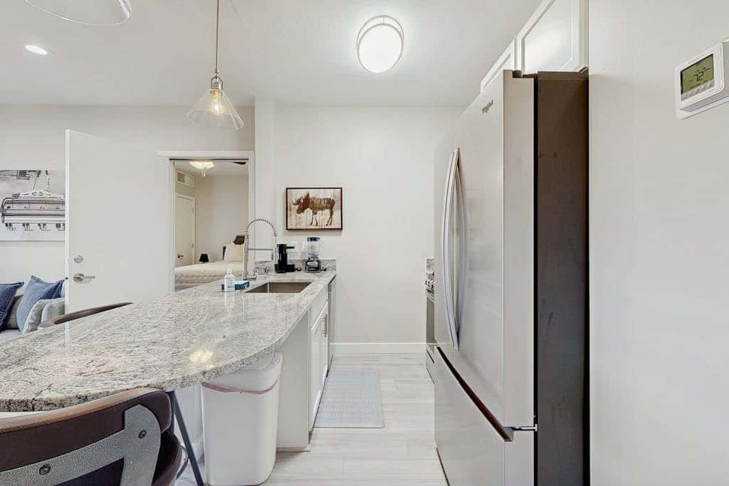 Newly renovated 2nd floor condo with pool, hot tub and in home laundry
