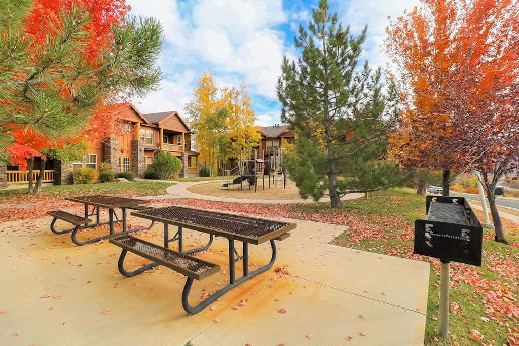 Stunning alpine escape with  pool, hot tub, fireplace, balcony, & mountain views