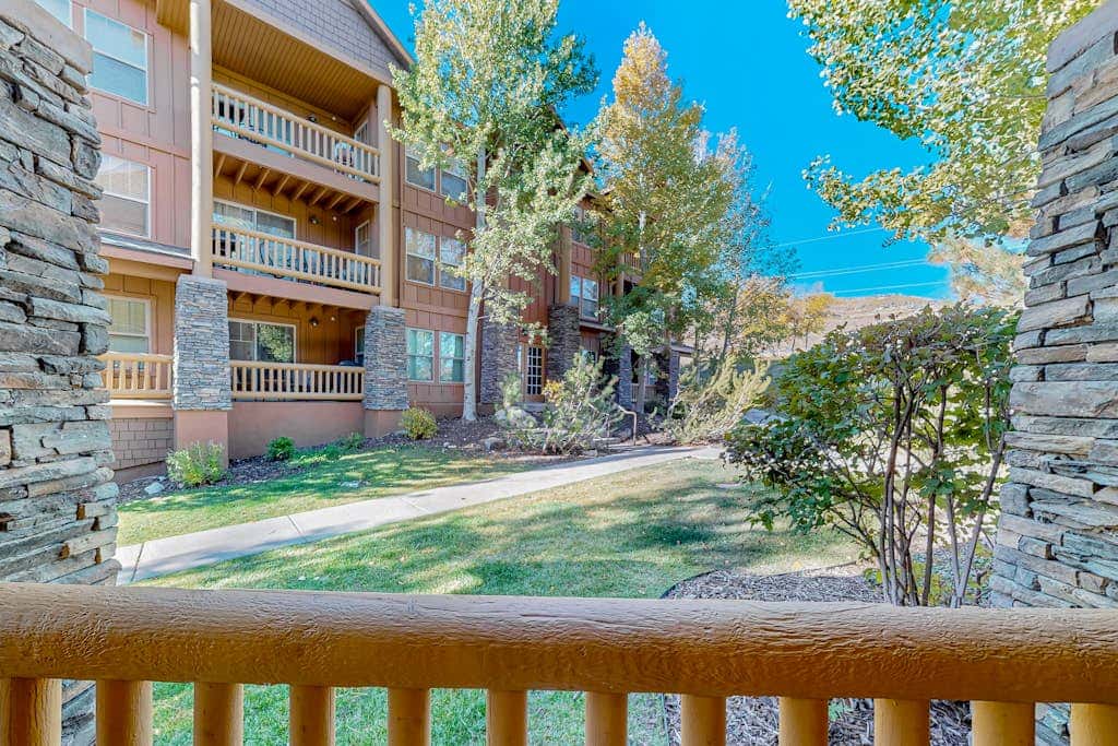 Stunning alpine escape with  pool, hot tub, fireplace, balcony, & mountain views