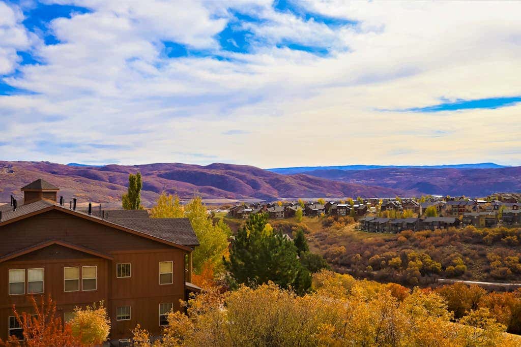 Stunning alpine escape with  pool, hot tub, fireplace, balcony, & mountain views