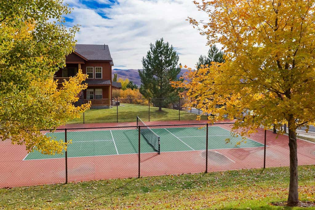 Stunning alpine escape with  pool, hot tub, fireplace, balcony, & mountain views