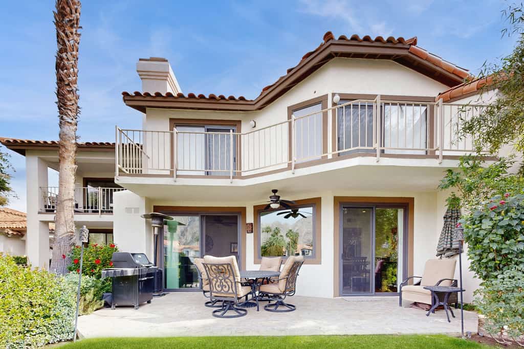 Relax in this 2BR/2.5BA home in La Quinta overlooking a peaceful pond near PGA West Golf Course.