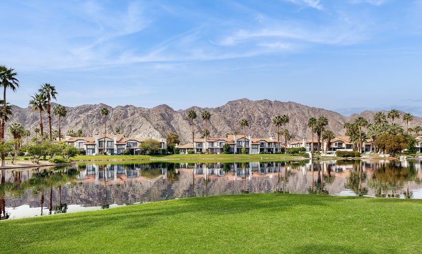 Relax in this 2BR/2.5BA home in La Quinta overlooking a peaceful pond near PGA West Golf Course.