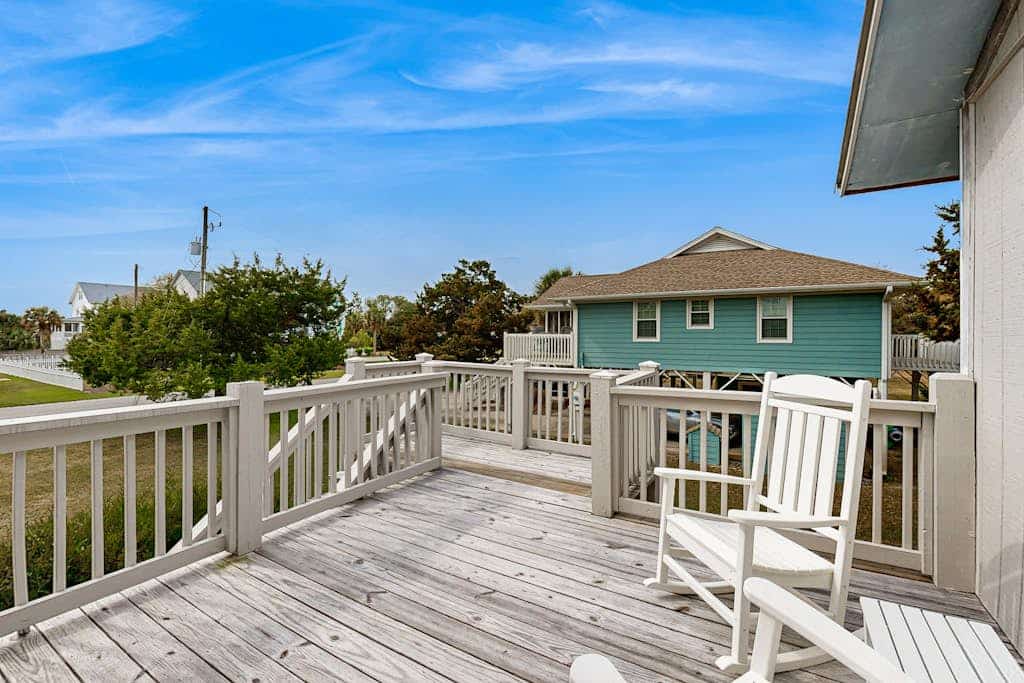 Beach home with huge lawn, open deck, covered patio & grill