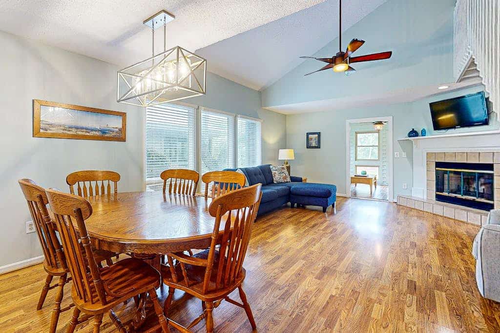 Golf course-front condo with screened sunroom & minutes from beach