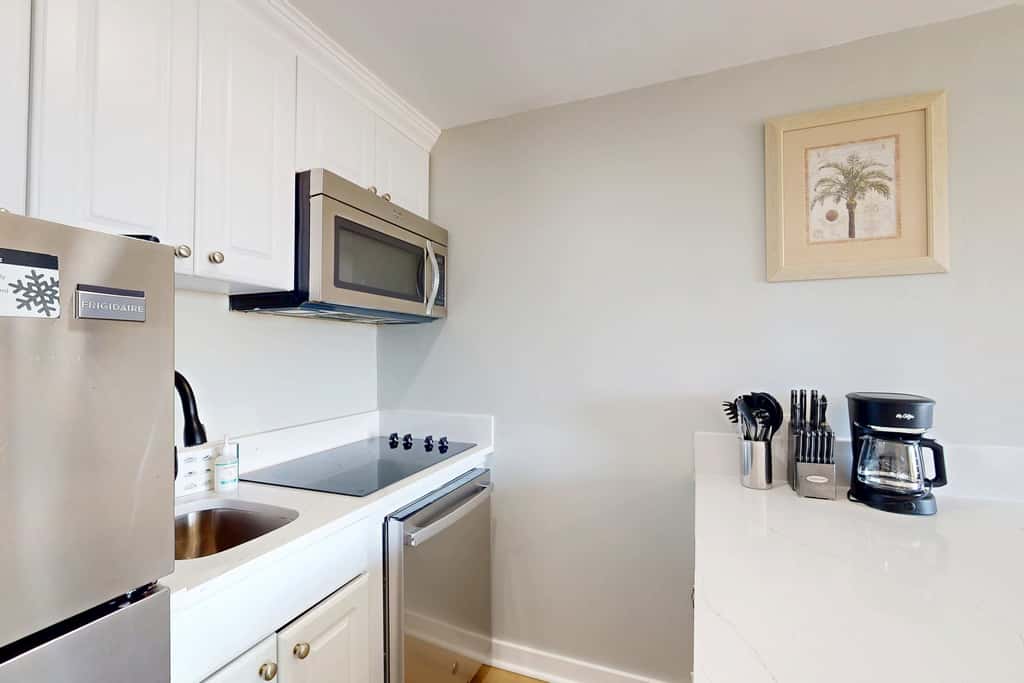Beach-view condo in oceanfront complex with outdoor pool, beach access, balcony