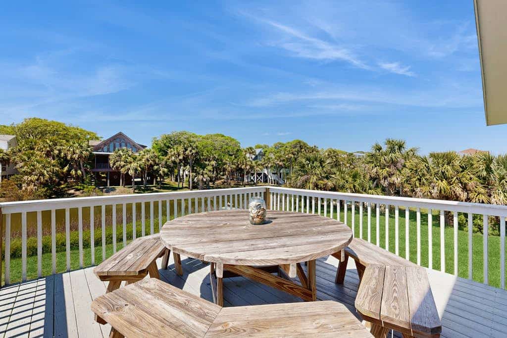 Newly renovated lagoon-view home with screen porch & patio - short walk to beach