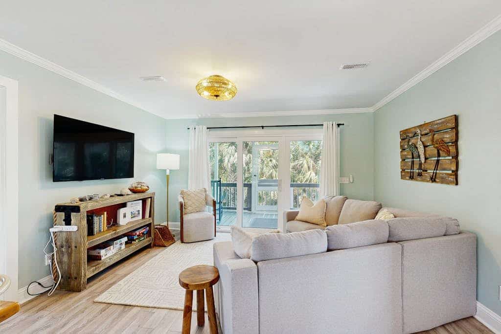 Newly renovated lagoon-view home with screen porch & patio - short walk to beach