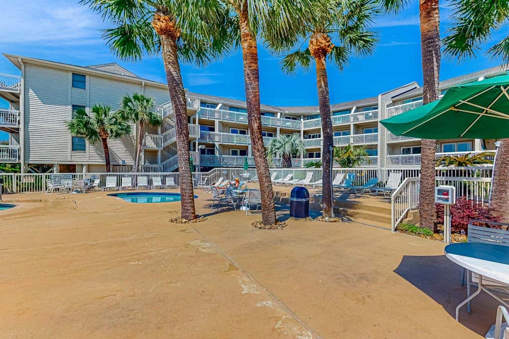 Condo with Coligny Beach views, outdoor pool, beach access, balcony, WD, & AC