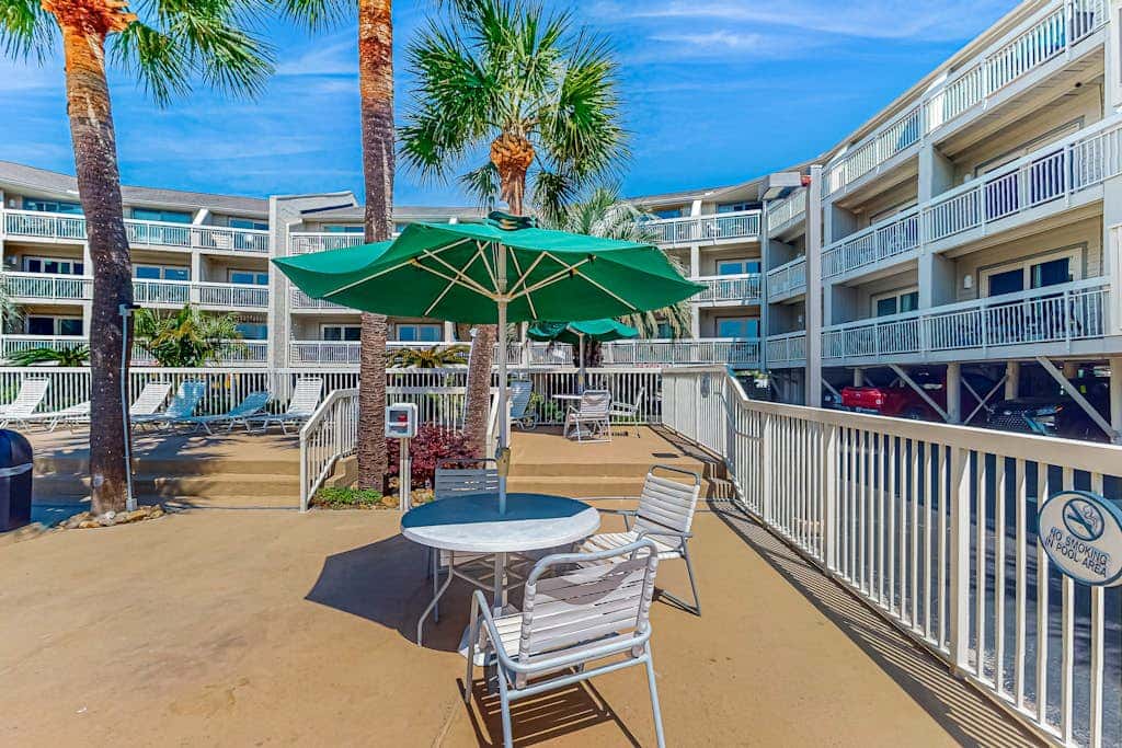 Condo with Coligny Beach views, outdoor pool, beach access, balcony, WD, & AC