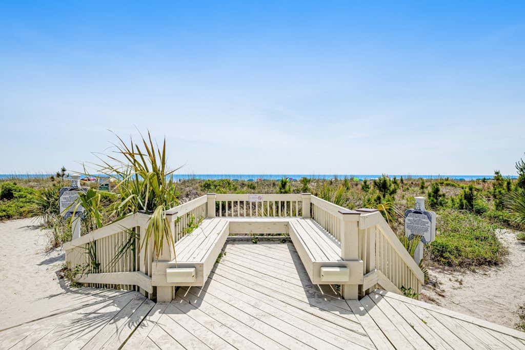 Condo with Coligny Beach views, outdoor pool, beach access, balcony, WD, & AC